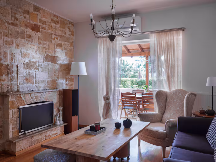 Soggiorno di Evi’s Voula Home, casa vacanze con 3 camere da letto a Voula